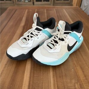 Nike kids White and Light blue basketball shoes. Size 4.